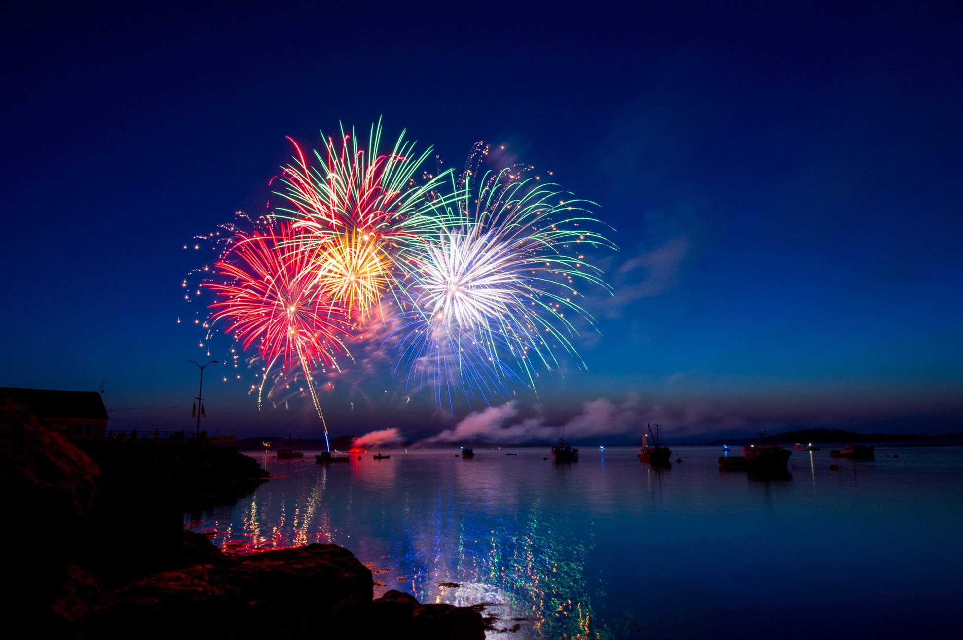 night time fireworks over water